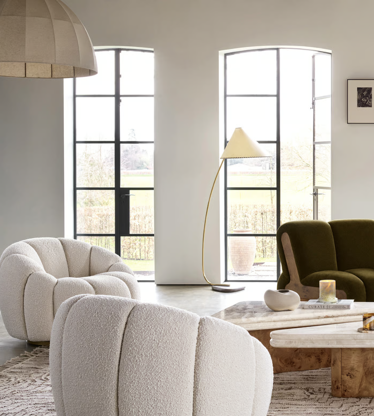 Modern interior design room scene with lounge chair and brass floor lamp showcasing procurement workflow